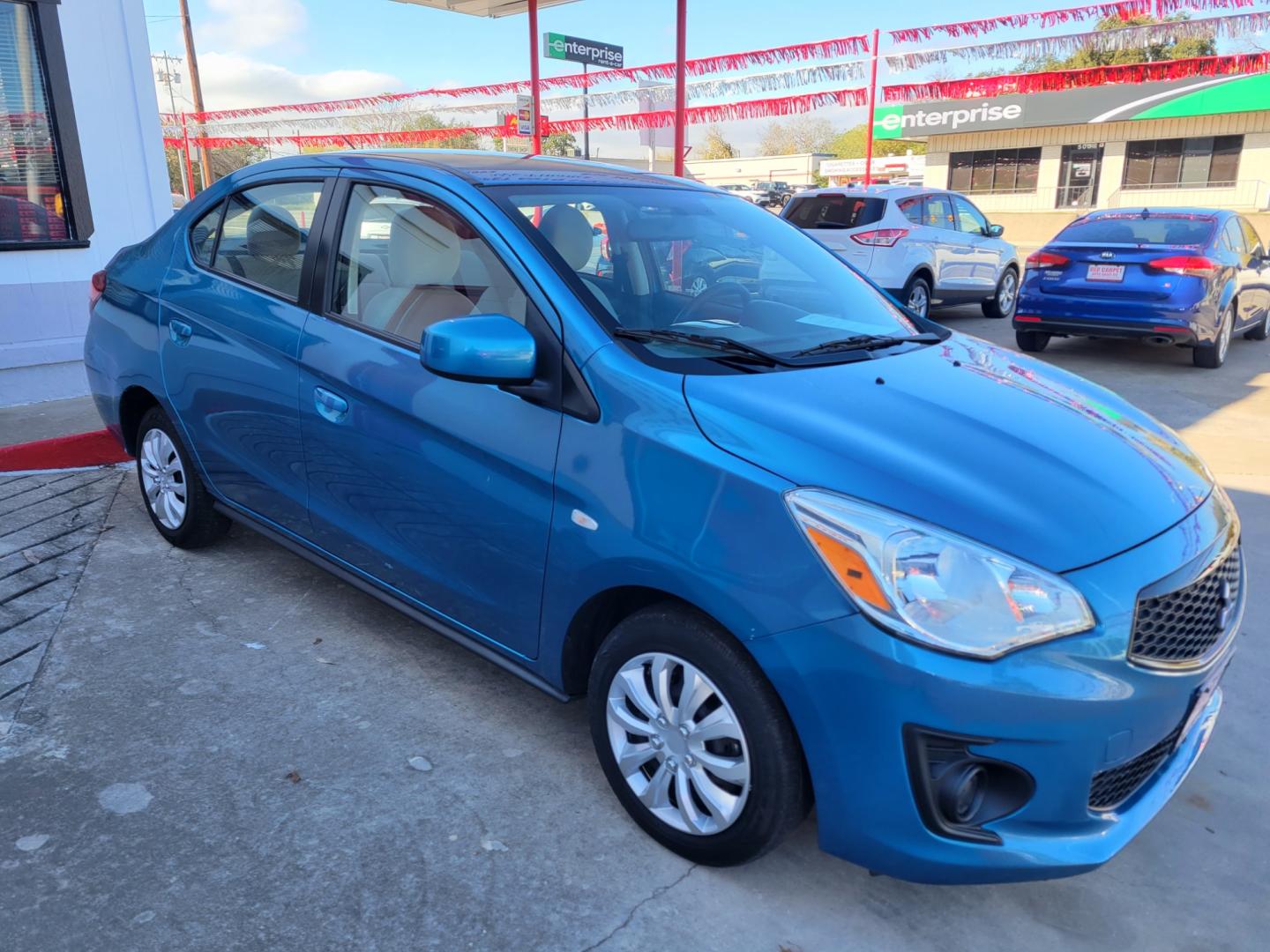 2020 Blue Mitsubishi Mirage G4 (ML32F3FJ1LH) with an 1.2L I3 F DOHC 12V engine, Automatic transmission, located at 503 West Court, Seguin, TX, 78155, (830) 379-3373, 29.568621, -97.969803 - Photo#1